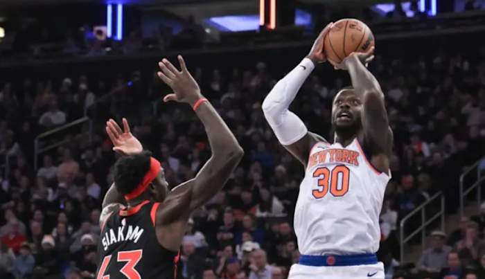Julius Randle shoots over Pascal Siakam during Monday's win